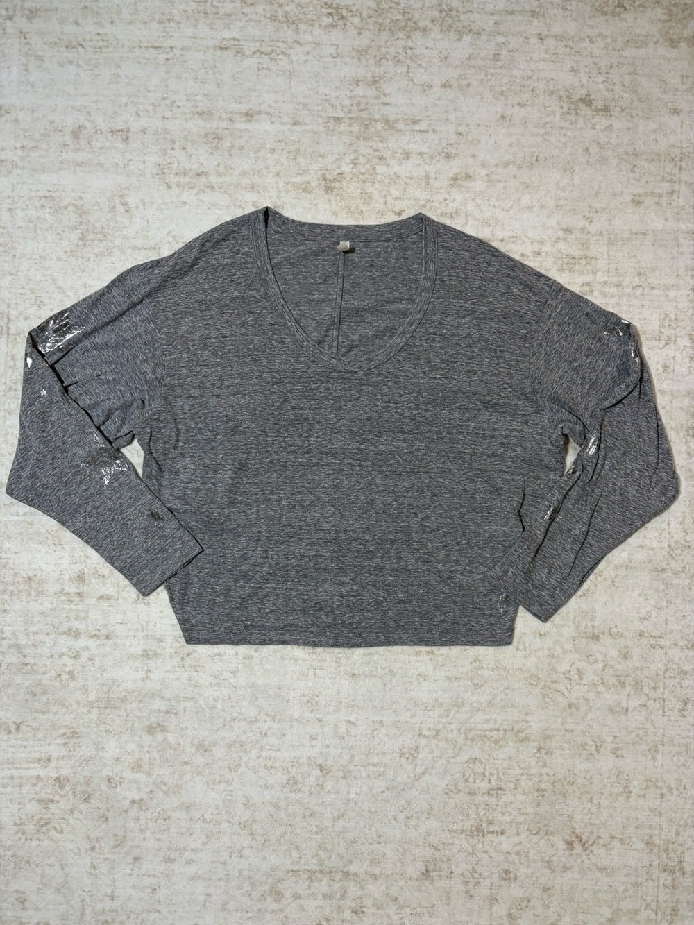 FP MOVEMENT M Gray cropped long sleeve shirt with silver stars on sleeves